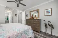 2085 Manor Parc Drive, Calabash, NC 28467 — 3-bedroom waterfront home in Kingfish Bay, Calabash, NC, photo 13 of 41: 64-web-or-mls-56 1st floor bedroom