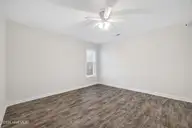 5332 Sun Coast Drive, Wilmington, NC 28411 — 3-bedroom home in Sun Coast, Wilmington, NC, photo 23 of 37: Child's room with furniture removed