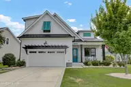 135 Spicer Lake Drive, Holly Ridge, NC 28445 — 4-bedroom waterfront home in Summerhouse On Everett Bay, Holly Ridge, NC, photo 1 of 75: 135 Spicer Lake Dr, Holly Ridge, NC
