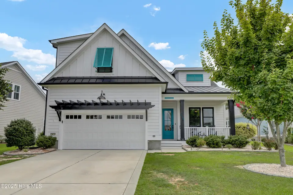 135 Spicer Lake Drive, Holly Ridge, NC 28445 — 4-bedroom waterfront home in Summerhouse On Everett Bay, Holly Ridge, NC, photo 1 of 75: 135 Spicer Lake Dr, Holly Ridge, NC