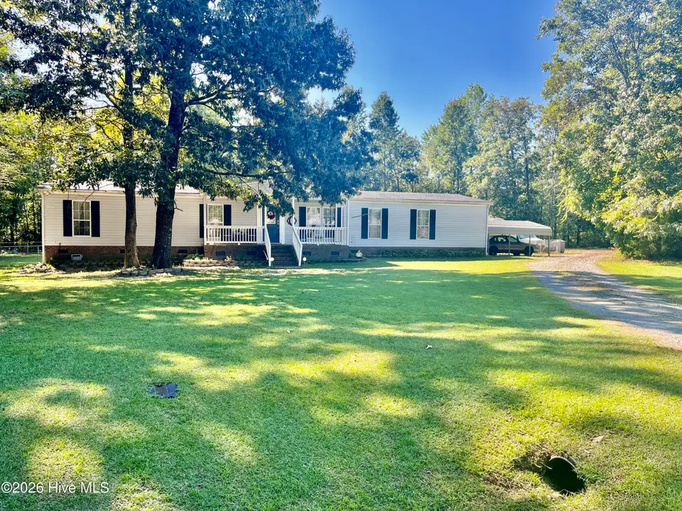 95 Live Oak Court, Kenly, NC 27542 — 4-bedroom manufactured home in Hickory Grove, Kenly, NC, photo 1 of 34: Front of Home