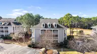3350 Club Villas Drive # 405, Southport, NC 28461 — 2-bedroom condo in St James, Southport, NC, photo 2 of 39: Front of building