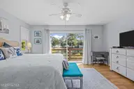 300 Mcginnis Drive, Pine Knoll Shores, NC 28512 — 3-bedroom waterfront condo in Mcginnis Point, Pine Knoll Shores, NC, photo 22 of 57: Primary First Fl BR 3