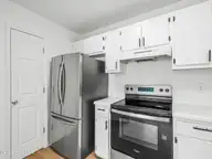 625 S Hampton Drive, Jacksonville, NC 28546 — 3-bedroom home in Cottage Cove, Jacksonville, NC, photo 16 of 50: French Door Samsung Refrigerator
