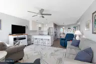 9201 Coast Guard Road A208, Emerald Isle, NC 28594 — 3-bedroom waterfront condo in Pebble Beach, Emerald Isle, NC, photo 9 of 45: Living room with ocean views