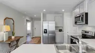 2011 Snipe Lane, Shallotte, NC 28470 — 3-bedroom home in The Meadows at Wildwood Village, Shallotte, NC, photo 3 of 25: Kitchen