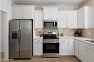 59 S Bandwheel Way, Hampstead, NC 28443 — 4-bedroom home in Sawyers Run, Hampstead, NC, photo 8 of 30: kitchen-01c
