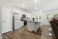 223 Rosemount, Rocky Mount, NC 27804 — 4-bedroom home in Belmont Lake Preserve, Rocky Mount, NC, photo 19 of 38: Eat-In Kitchen with functional bar top