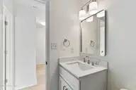 4930 N Hampton Drive SE, Southport, NC 28461 — 3-bedroom waterfront home in Carolina Place, Southport, NC, photo 21 of 58: Guest Bathroom