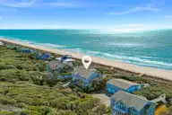 217 Salter Path Road, Pine Knoll Shores, NC 28512 — 4-bedroom waterfront home in Pine Knoll Association, Pine Knoll Shores, NC, photo 1 of 62: Oceanfront Home in Pine Knoll Shores