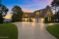 609 Neuse Harbour Boulevard, New Bern, NC 28560 — 4-bedroom waterfront home in Neuse Harbour, New Bern, NC, photo 1 of 57: front of home