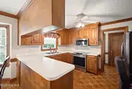 753 Brassie Club Drive, Rocky Mount, NC 27804 — 4-bedroom home in Northgreen Village, Rocky Mount, NC, photo 15 of 49: Kitchen View 3