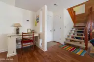 142 Lagoon Lane, Pine Knoll Shores, NC 28512 — 3-bedroom waterfront condo in Mcginnis Point, Pine Knoll Shores, NC, photo 24 of 41: Foyer to 2nd Level