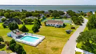 161 Camp Morehead Drive, Morehead City, NC 28557 — 3-bedroom home in Camp Morehead, Morehead City, NC, photo 4 of 68: Community Pool View