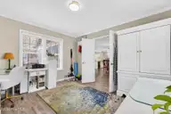 125 Lighthouse Drive, Carolina Beach, NC 28428 — 3-bedroom home in Carolina Beach Village, Carolina Beach, NC, photo 22 of 70: Front room/Office