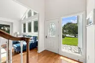 109 Oakleaf Drive, Pine Knoll Shores, NC 28512 — 3-bedroom waterfront home in Fairway Villas, Pine Knoll Shores, NC, photo 8 of 66: Front door