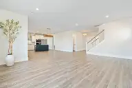 1368 Trisail Terrace, Wilmington, NC 28412 — 3-bedroom home in Riverlights, Wilmington, NC, photo 13 of 68: 1368 Trisail Living to stairs