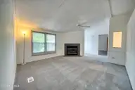 554 Dark Oak Street SW, Shallotte, NC 28470 — 2-bedroom waterfront manufactured home in Lakewood Estates, Shallotte, NC, photo 8 of 32