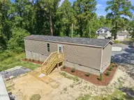 485 Spring Lake Road, Pinehurst, NC 28374 — 2-bedroom manufactured home, Pinehurst, NC, photo 7 of 36: 6-web-or-mls-DJI_20260818114625_0562_D