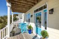 127 Sound Point Drive, Harkers Island, NC 28531 — 4-bedroom home in Cape Point Village, Harkers Island, NC, photo 4 of 56: Covered Front Porch