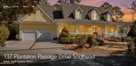 137 Plantation Passage Drive SE, Bolivia, NC 28422 — 4-bedroom home in Winding River Plantation, Bolivia, NC, photo 2 of 70: Photo 137 PLANTATION PASSAGE Screenshot
