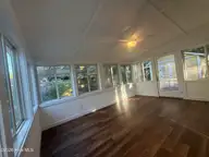 108 NW 29th Street, Oak Island, NC 28465 — 3-bedroom home in Pinners Point, Oak Island, NC, photo 12 of 16: Carolina Room