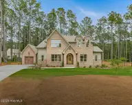 245 Paulson Court, Pinehurst, NC 28374 — 4-bedroom home in Longleaf Pointe, Pinehurst, NC, photo 1 of 63: 260620-245Paulson(Staged)-0111
