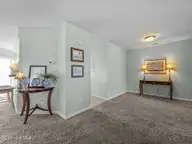 8713 Plantation Drive 402, Emerald Isle, NC 28594 — 3-bedroom waterfront townhome in Emerald Plantation, Emerald Isle, NC, photo 7 of 68: Living Room 3