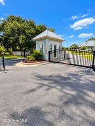 400 1 Sunrise Court, Emerald Isle, NC 28594 — waterfront lot in Sunset Landing, Emerald Isle, NC, photo 5 of 6: Sunny Coastal Community Gatehouse