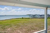 7663 Myrtle Grove Road, Wilmington, NC 28409 — 1-bedroom waterfront home in Egret Point, Wilmington, NC, photo 10 of 30: 7663 Myrtle Grove Rd