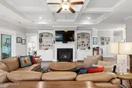 2585 Parkridge Drive, Southport, NC 28461 — 4-bedroom waterfront home in St James, Southport, NC, photo 15 of 77: Recessed lights in bookcase shelving