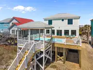 2205 E Beach Drive, Oak Island, NC 28465 — 6-bedroom waterfront home in Long Beach, Oak Island, NC, photo 2 of 55