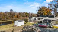 2157 Lakeside Avenue SW, Supply, NC 28462 — 3-bedroom waterfront manufactured home in Lakeside, Supply, NC, photo 3 of 53: 5_drone