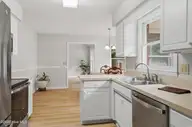 312 Wendover Lane, Wilmington, NC 28411 — 3-bedroom home in Wendover, Wilmington, NC, photo 11 of 35: Kitchen to DR