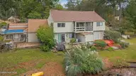 84 Quarterdeck Townes, New Bern, NC 28562 — 3-bedroom waterfront townhome in River Bend, New Bern, NC, photo 9 of 46: 5-web-or-mls-DJI_20251014111001_0527_D