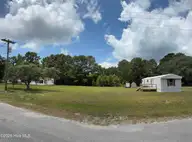 1545 Pelican Place SW, Shallotte, NC 28470 — waterfront lot in Shell Point, Shallotte, NC, photo 2 of 3