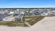 461 E Third Street, Ocean Isle Beach, NC 28469 — 4-bedroom waterfront home, Ocean Isle Beach, NC, photo 5 of 57: DJI_20260512105459_0838_D-1