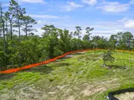 601 Caisson Run, Wilmington, NC 28412 — 4-bedroom home in Riverlights, Wilmington, NC, photo 3 of 30: SW view from upper rear porch