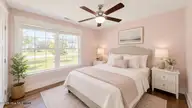 1129 Coral Reef Drive, New Bern, NC 28560 — 4-bedroom home in Fairfield Harbour, New Bern, NC, photo 7 of 62: bedroom 2