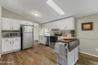 406 Ensign Court, Hampstead, NC 28443 — 3-bedroom manufactured home in Topsail Greens, Hampstead, NC, photo 13 of 35