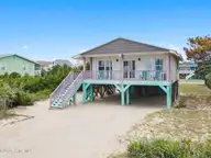 926 E Beach Drive, Oak Island, NC 28465 — 3-bedroom waterfront home, Oak Island, NC, photo 1 of 36: 2-web-or-mls-CAMMediaLLC.com 923-2
