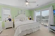 415 Sailfish Street, Sunset Beach, NC 28468 — 4-bedroom waterfront home in Sunset Beach, Sunset Beach, NC, photo 22 of 63: Primary Bedroom
