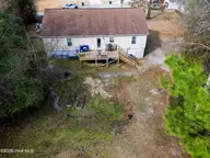 206 Hominy Court, Hubert, NC 28539 — 3-bedroom home in Ole Mill Village, Hubert, NC, photo 19 of 27: Backyard