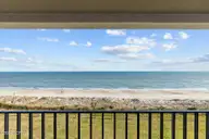 1505 Salter Path Road 304, Indian Beach, NC 28512 — 2-bedroom waterfront condo in Summer Winds Condominiums, Indian Beach, NC, photo 5 of 53: Balcony View