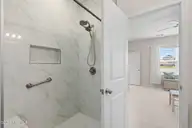 9414 Barnstormer Drive, Carolina Shores, NC 28467 — 3-bedroom waterfront home in Eagle Run, Carolina Shores, NC, photo 23 of 41: Primary Bathroom