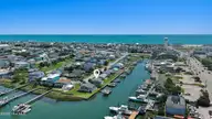 213 W Bogue Sound Drive, Atlantic Beach, NC 28512 — 3-bedroom waterfront home in Sound View Isles, Atlantic Beach, NC, photo 2 of 50: Fabulous waterfront home in AB