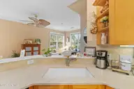 1310 Grandiflora Drive, Leland, NC 28451 — 4-bedroom home in Magnolia Greens, Leland, NC, photo 13 of 56: 15_kitchen
