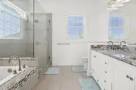 1318 N New River Drive, Surf City, NC 28445 — 5-bedroom home in Del Mar Beach, Surf City, NC, photo 9 of 30: Master Suite Double vanity