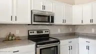100 Star Court, Aberdeen, NC 28315 — 3-bedroom home in Shepherds Ridge, Aberdeen, NC, photo 12 of 34: Kitchen - Electric Range/Oven