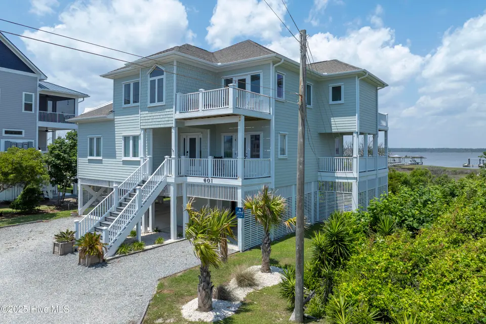 601 New River Inlet Road, North Topsail Beach, NC 28460 — 8-bedroom waterfront home in Sea Dunes Village, North Topsail Beach, NC, photo 1 of 71: 601 New River Inlet Rd